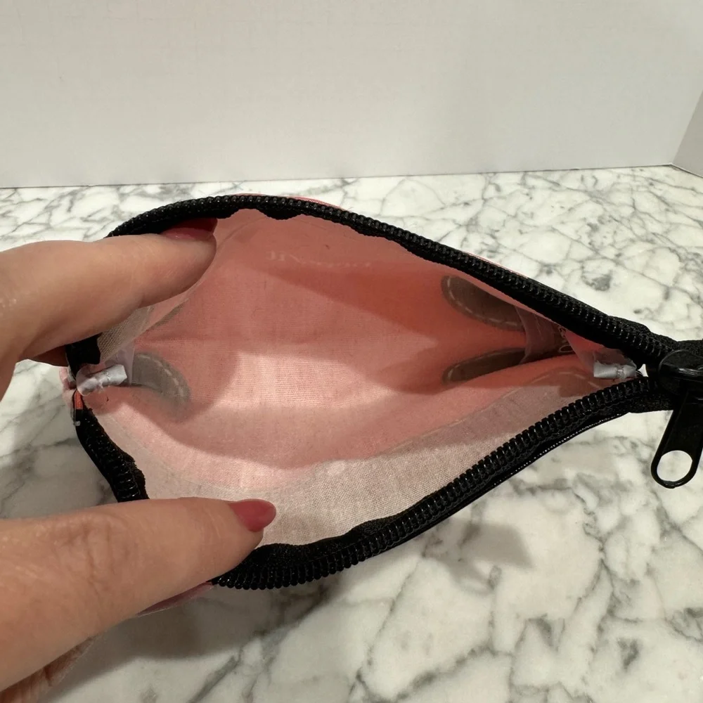 Benefit and Clinique Vintage makeup pouches